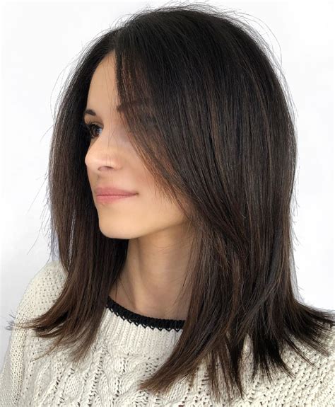 It is an edgy and bold look, that comes as a contrast to a medium length hair. . Medium hair cuts women